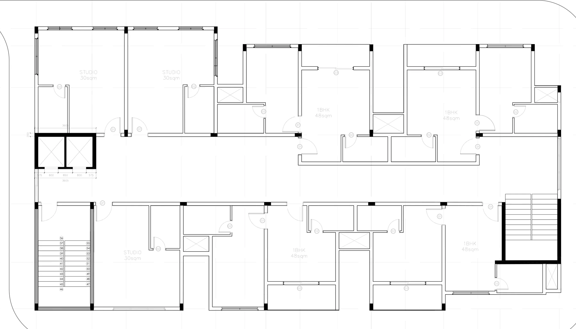 Typical floor plan at 1:100: studio and 1BHK units along a double-loaded corridor, lift and two staircases.